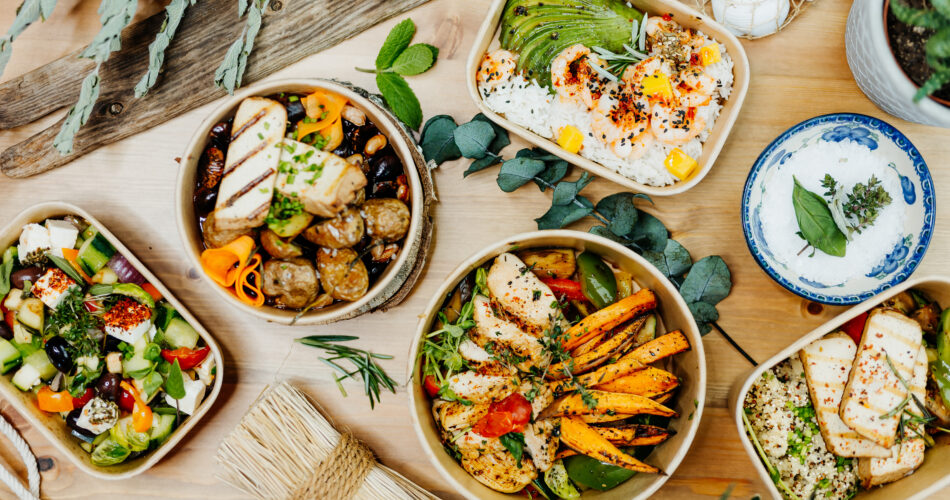 Various healthy and vitamin-rich dishes and food in an ecobox delivered by a delivery service, ordered online